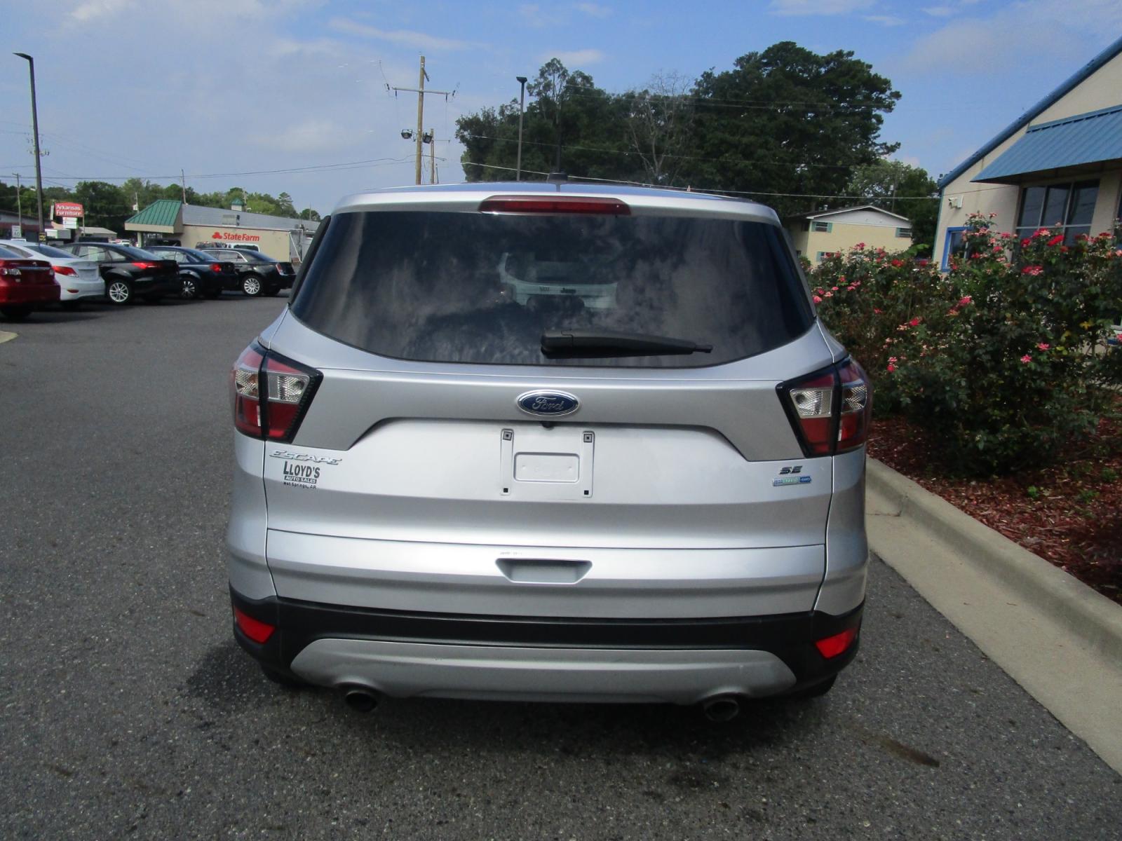 2017 /Tan / Cloth Ford Escape SE 4WD (1FMCU9GD0HU) with an 1.5L L4 DOHC 16V engine, 6A transmission, located at 1814 Albert Pike Road, Hot Springs, AR, 71913, (501) 623-1717, 34.494228, -93.094070 - Photo #3