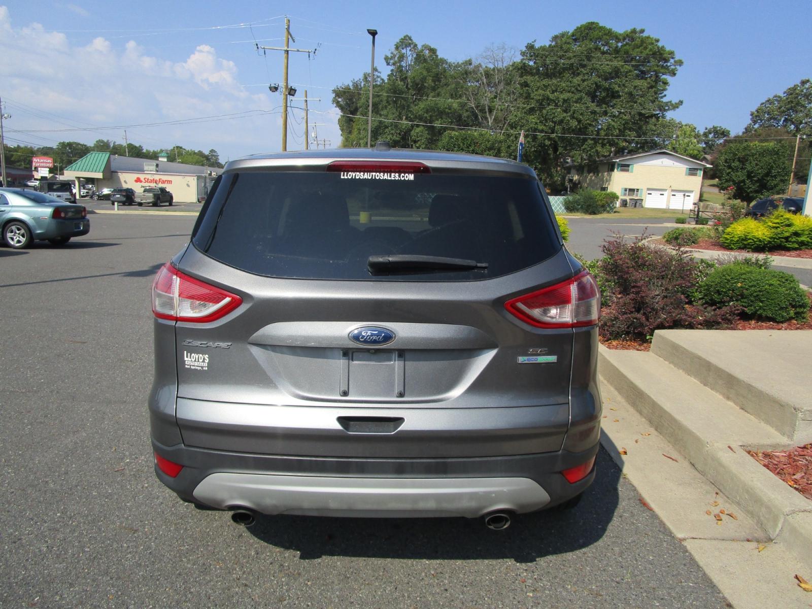 2014 Grey /Gray / Cloth Ford Escape SE FWD (1FMCU0GX6EU) with an 1.6L L4 DOHC 16V engine, 6-Speed Automatic transmission, located at 1814 Albert Pike Road, Hot Springs, AR, 71913, (501) 623-1717, 34.494228, -93.094070 - Photo #4