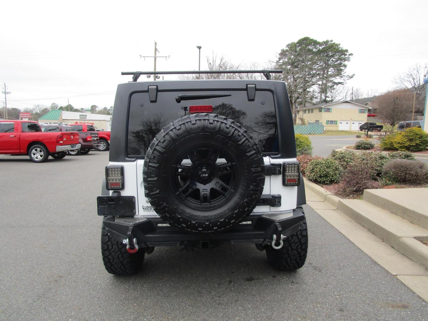 2012 WHITE /Tan/Leather Jeep Wrangler Unlimited Rubicon 4WD (1C4HJWFG9CL) with an 3.6L V6 DOHC 24V FFV engine, located at 1814 Albert Pike Road, Hot Springs, AR, 71913, (501) 623-1717, 34.494228, -93.094070 - Photo#3