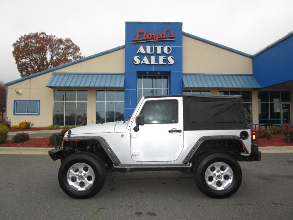 2009 SILVER /Black / Cloth Jeep Wrangler X (1J4FA24109L) with an 3.8L V6 OHV 12V engine, located at 1814 Albert Pike Road, Hot Springs, AR, 71913, (501) 623-1717, 34.494228, -93.094070 - Photo #0