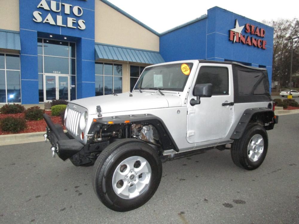 2009 SILVER /Black / Cloth Jeep Wrangler X (1J4FA24109L) with an 3.8L V6 OHV 12V engine, located at 1814 Albert Pike Road, Hot Springs, AR, 71913, (501) 623-1717, 34.494228, -93.094070 - Photo #1