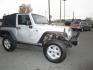 2009 SILVER /Black / Cloth Jeep Wrangler X (1J4FA24109L) with an 3.8L V6 OHV 12V engine, located at 1814 Albert Pike Road, Hot Springs, AR, 71913, (501) 623-1717, 34.494228, -93.094070 - Photo #3