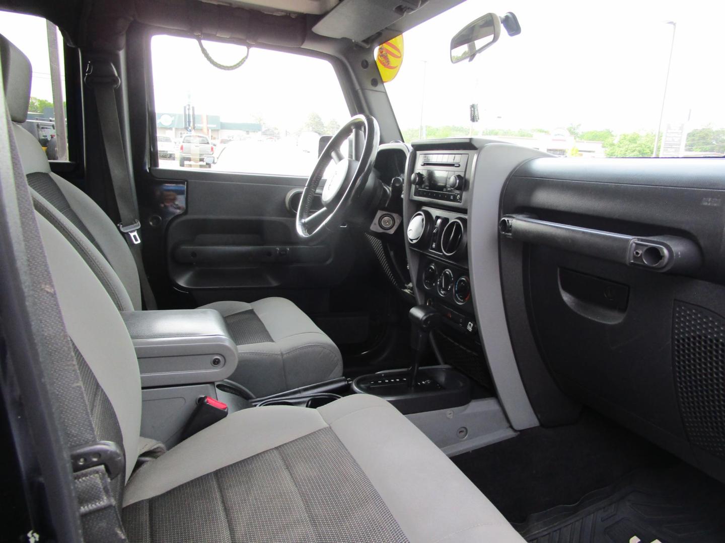 2009 BLACK /Gray/Cloth Jeep Wrangler Unlimited X 4WD (1J4GA39199L) with an 3.8L V6 OHV 12V engine, located at 1814 Albert Pike Road, Hot Springs, AR, 71913, (501) 623-1717, 34.494228, -93.094070 - Photo#7