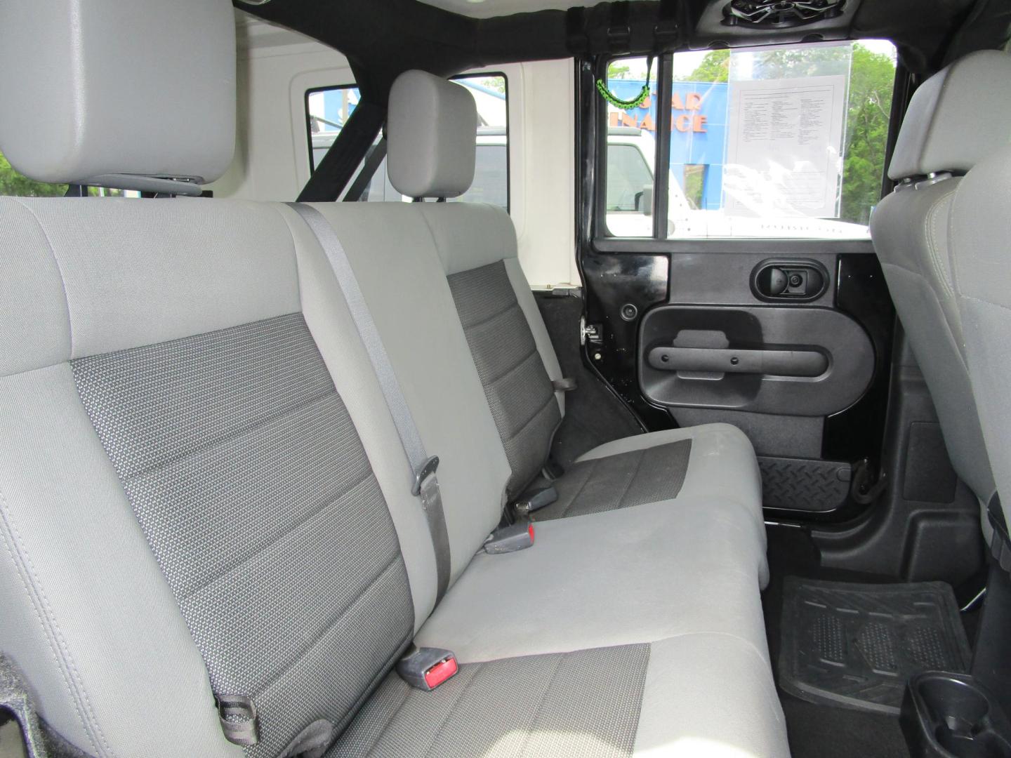 2009 BLACK /Gray/Cloth Jeep Wrangler Unlimited X 4WD (1J4GA39199L) with an 3.8L V6 OHV 12V engine, located at 1814 Albert Pike Road, Hot Springs, AR, 71913, (501) 623-1717, 34.494228, -93.094070 - Photo#9