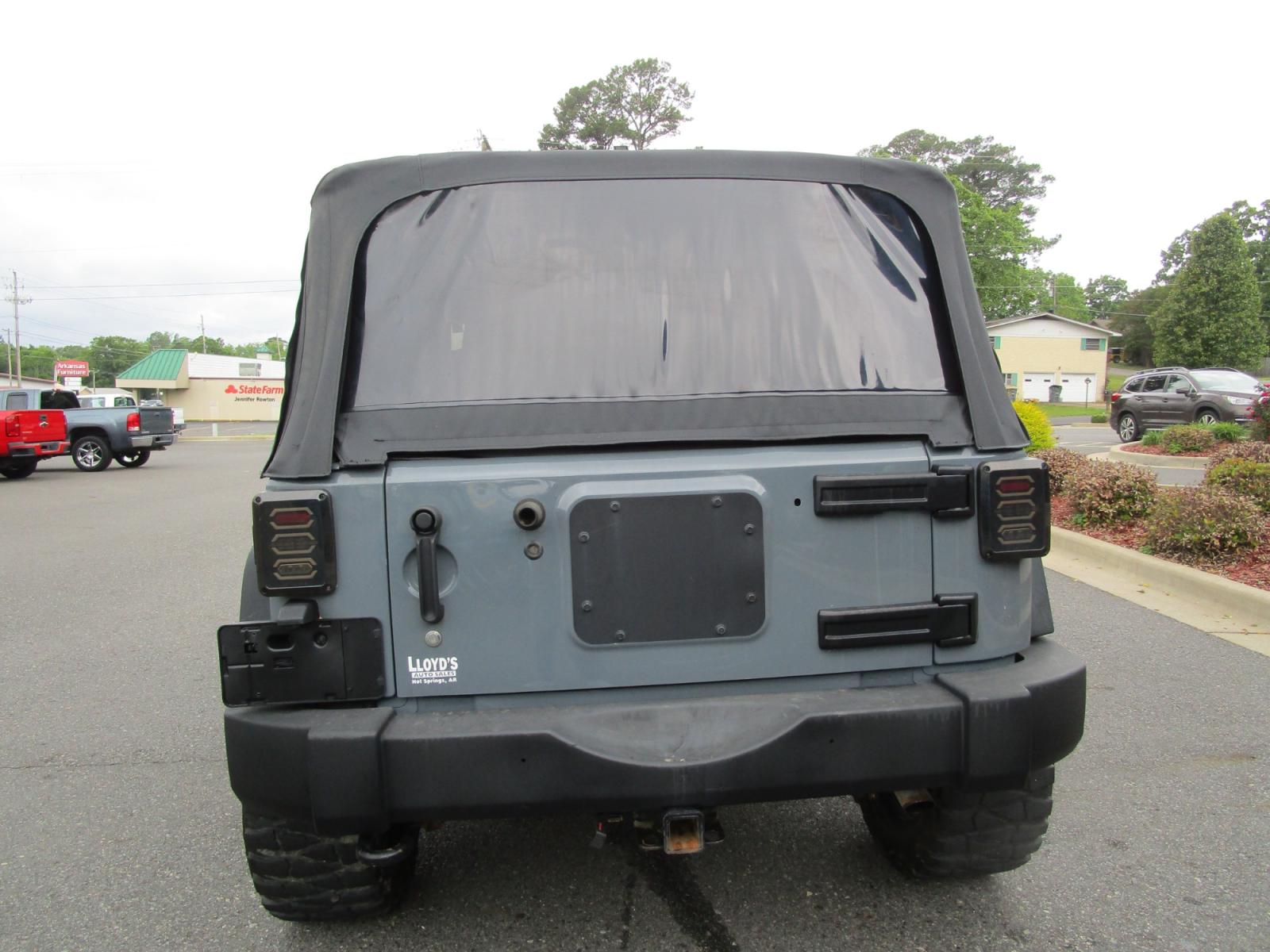 2014 GRAY /Gray Jeep Wrangler Sport 4WD (1C4AJWAG5EL) with an 3.6L V6 DOHC 24V FFV engine, located at 1814 Albert Pike Road, Hot Springs, AR, 71913, (501) 623-1717, 34.494228, -93.094070 - Photo #4