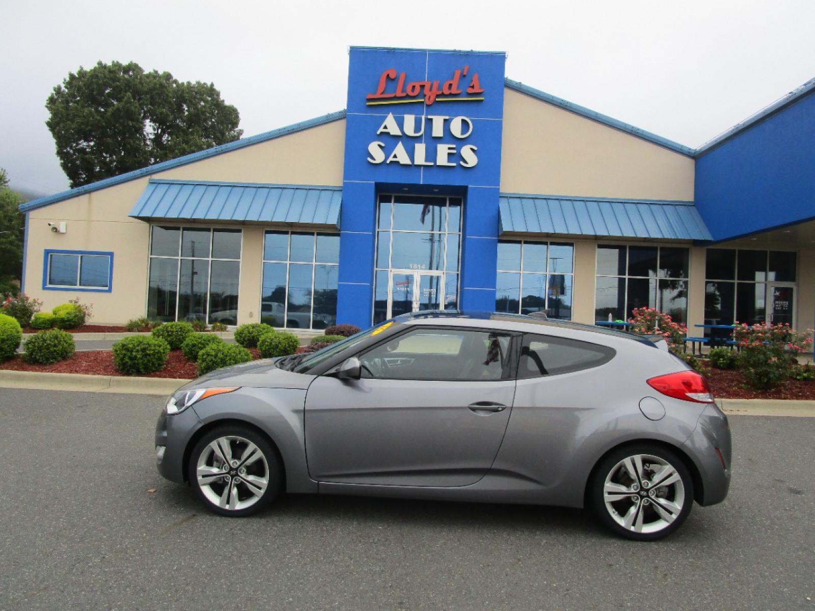 2016 GRAY /Gray / Cloth Hyundai Veloster Base 6MT (KMHTC6AD6GU) with an 1.6L L4 DOHC 16V engine, 6-Speed Manual transmission, located at 1814 Albert Pike Road, Hot Springs, AR, 71913, (501) 623-1717, 34.494228, -93.094070 - Photo #0
