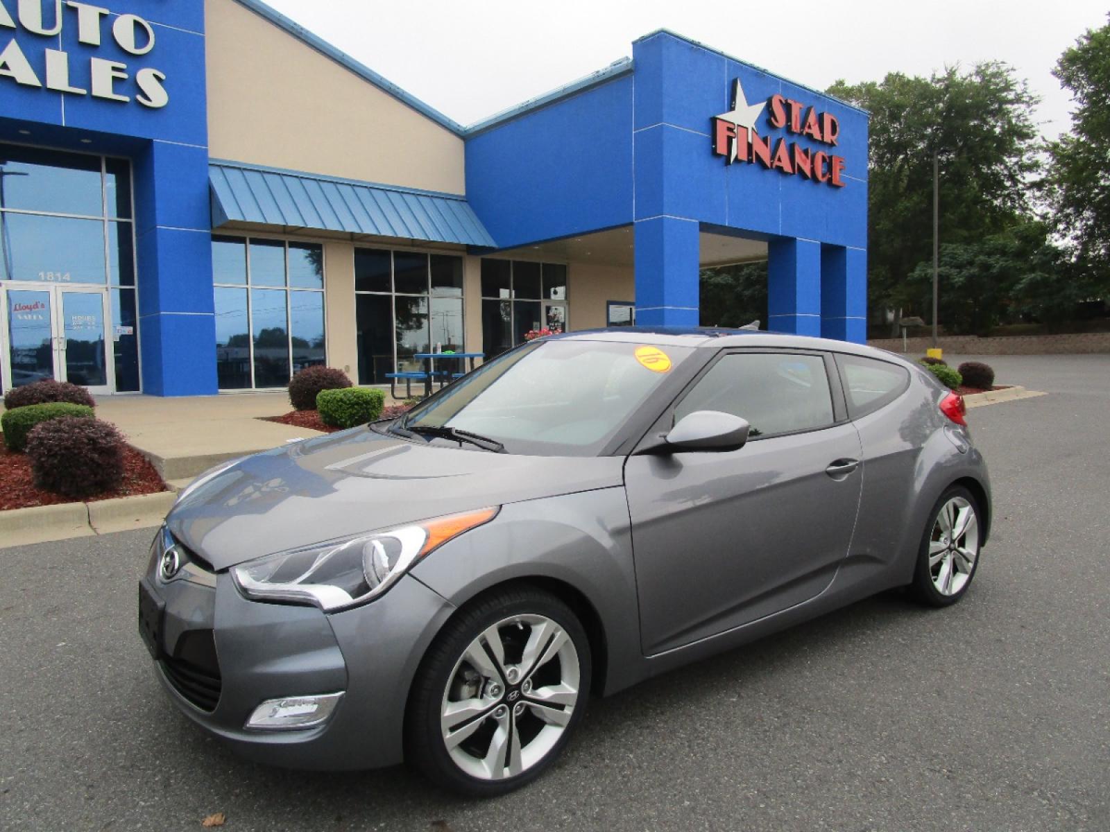 2016 GRAY /Gray / Cloth Hyundai Veloster Base 6MT (KMHTC6AD6GU) with an 1.6L L4 DOHC 16V engine, 6-Speed Manual transmission, located at 1814 Albert Pike Road, Hot Springs, AR, 71913, (501) 623-1717, 34.494228, -93.094070 - Photo #1