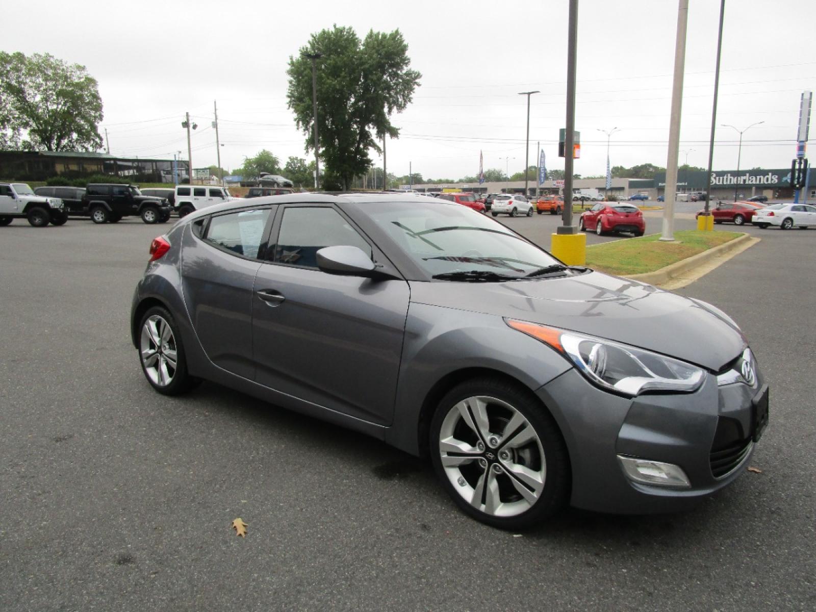 2016 GRAY /Gray / Cloth Hyundai Veloster Base 6MT (KMHTC6AD6GU) with an 1.6L L4 DOHC 16V engine, 6-Speed Manual transmission, located at 1814 Albert Pike Road, Hot Springs, AR, 71913, (501) 623-1717, 34.494228, -93.094070 - Photo #3