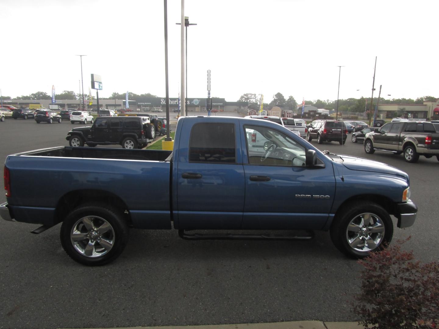 2004 Blue /Gray / Cloth Dodge Ram 1500 Laramie Quad Cab 2WD (1D7HA18N44S) with an 4.7L V8 SOHC 16V engine, 5-Speed Automatic Overdrive transmission, located at 1814 Albert Pike Road, Hot Springs, AR, 71913, (501) 623-1717, 34.494228, -93.094070 - Photo#2