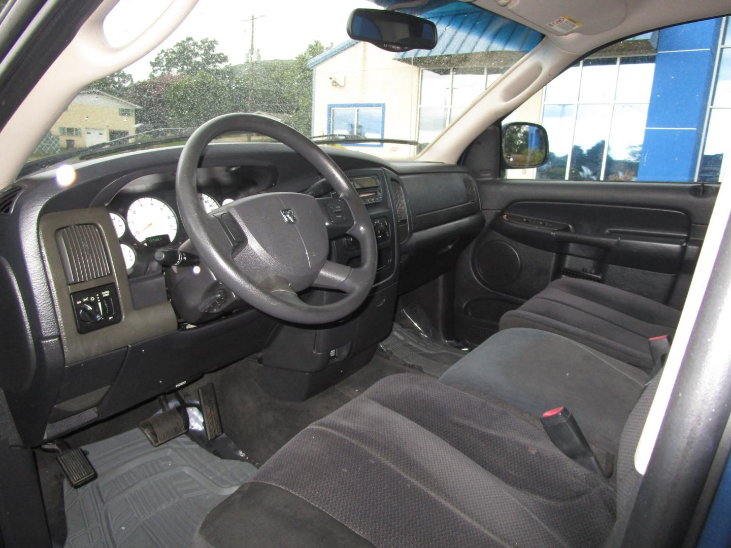 2004 Blue /Gray / Cloth Dodge Ram 1500 Laramie Quad Cab 2WD (1D7HA18N44S) with an 4.7L V8 SOHC 16V engine, 5-Speed Automatic Overdrive transmission, located at 1814 Albert Pike Road, Hot Springs, AR, 71913, (501) 623-1717, 34.494228, -93.094070 - Photo#4
