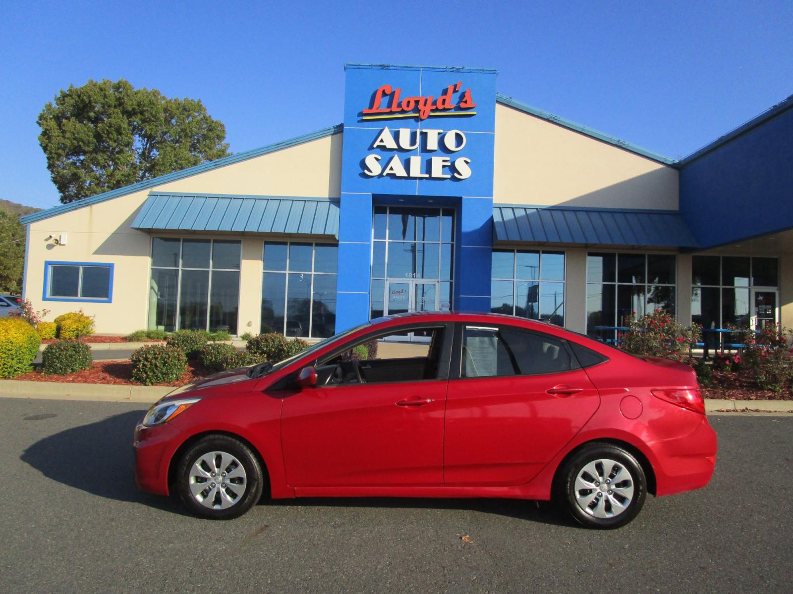 2015 RED /Tan / Cloth Hyundai Accent GLS 4-Door 6A (KMHCT4AEXFU) with an 1.6L L4 DOHC 16V engine, 6-Speed Automatic transmission, located at 1814 Albert Pike Road, Hot Springs, AR, 71913, (501) 623-1717, 34.494228, -93.094070 - Photo #0