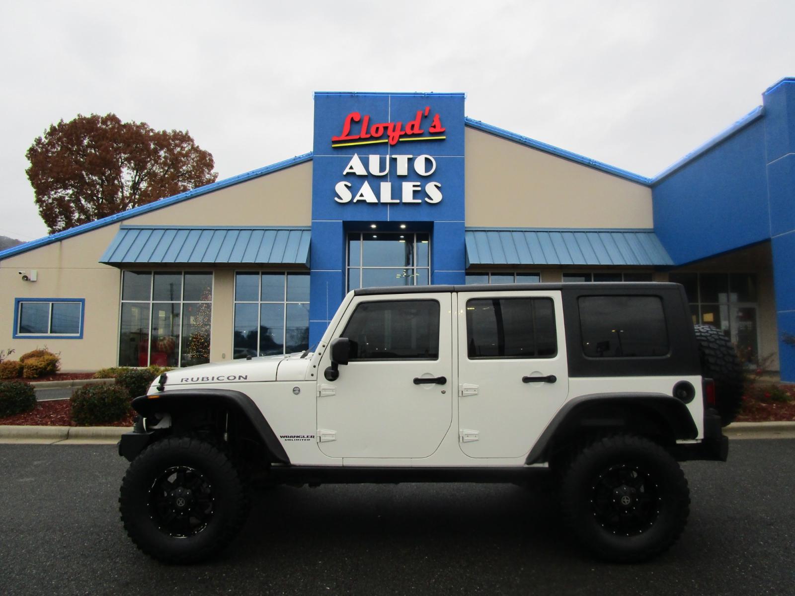 2010 WHITE /Black / Cloth Jeep Wrangler Unlimited Rubicon 4WD (1J4BA6H11AL) with an 3.8L V6 OHV 12V engine, located at 1814 Albert Pike Road, Hot Springs, AR, 71913, (501) 623-1717, 34.494228, -93.094070 - Photo #0