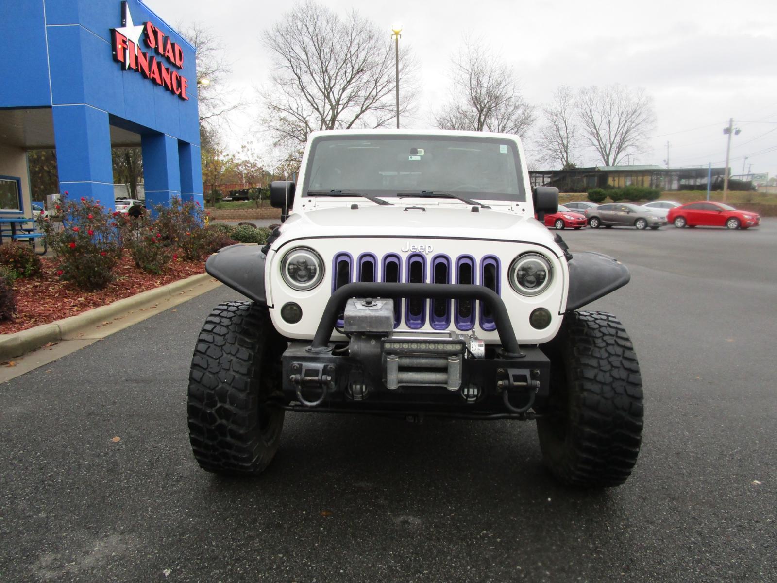 2010 WHITE /Black / Cloth Jeep Wrangler Unlimited Rubicon 4WD (1J4BA6H11AL) with an 3.8L V6 OHV 12V engine, located at 1814 Albert Pike Road, Hot Springs, AR, 71913, (501) 623-1717, 34.494228, -93.094070 - Photo #2