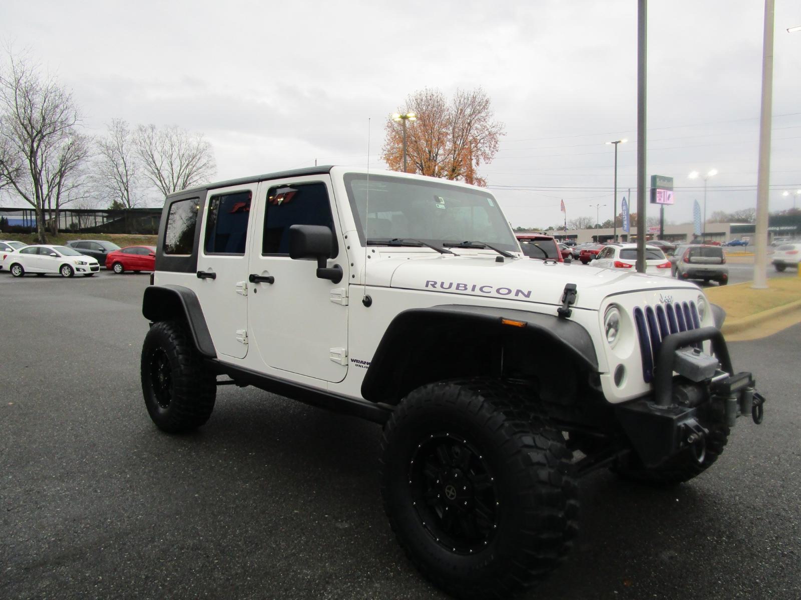 2010 WHITE /Black / Cloth Jeep Wrangler Unlimited Rubicon 4WD (1J4BA6H11AL) with an 3.8L V6 OHV 12V engine, located at 1814 Albert Pike Road, Hot Springs, AR, 71913, (501) 623-1717, 34.494228, -93.094070 - Photo #3
