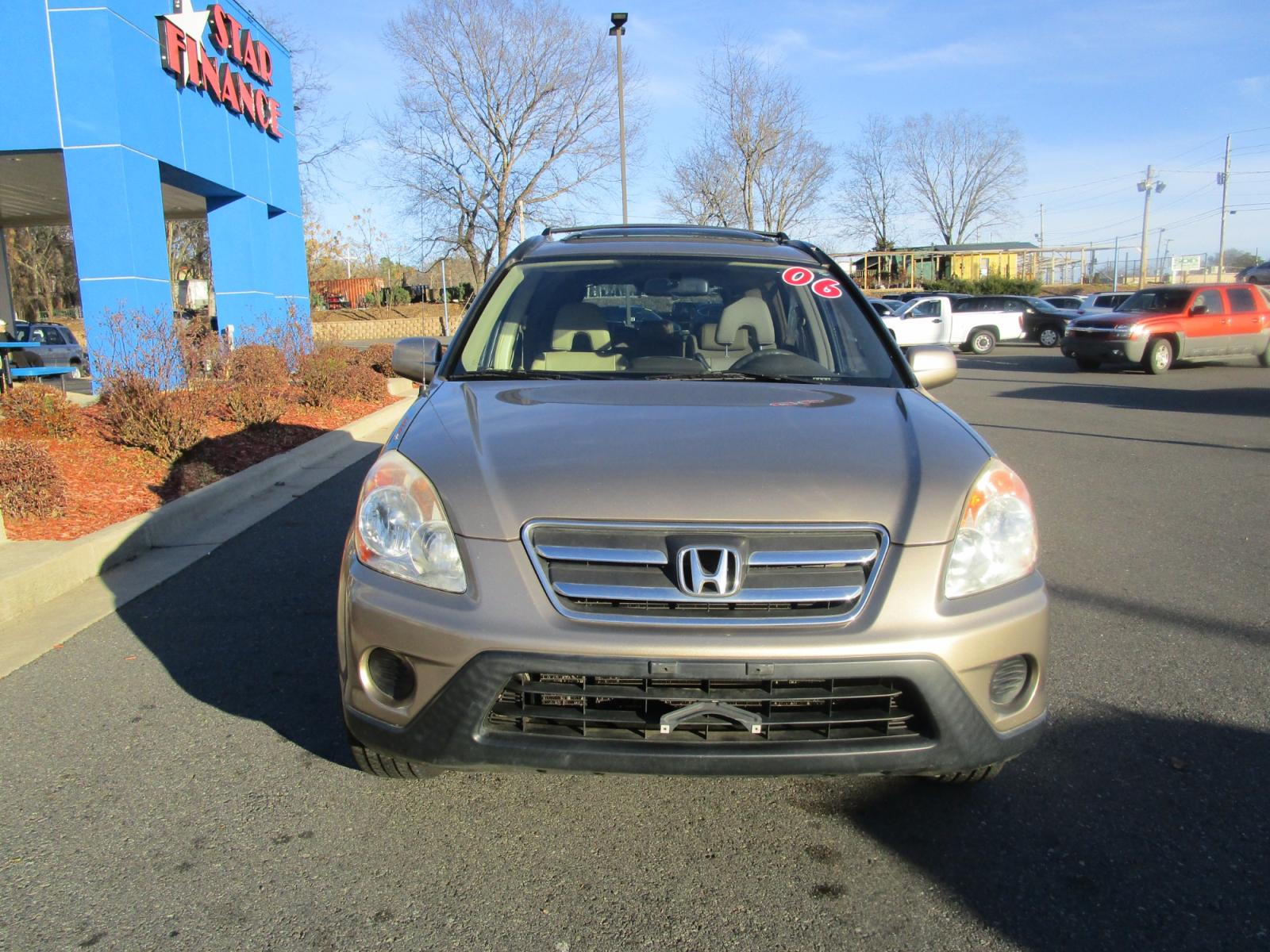 2006 Brown /Tan / Leather Honda CR-V SE 4WD AT (JHLRD78906C) with an 2.4L L4 DOHC 16V engine, 5-Speed Automatic Overdrive transmission, located at 1814 Albert Pike Road, Hot Springs, AR, 71913, (501) 623-1717, 34.494228, -93.094070 - Photo #1