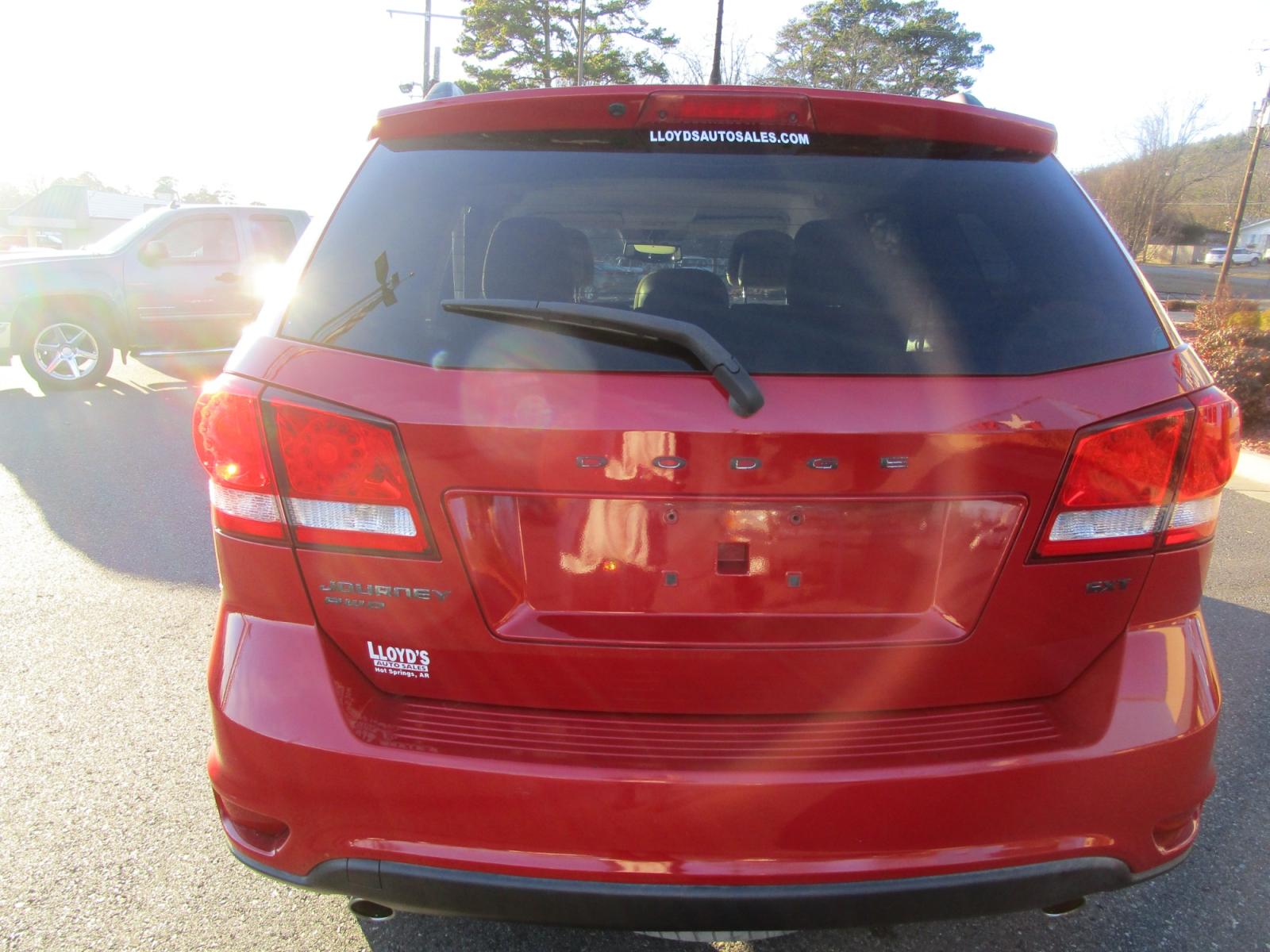 2013 RED /Black / Cloth Dodge Journey SXT AWD (3C4PDDBG1DT) with an 3.6L V6 DOHC 24V engine, 6-Speed Automatic transmission, located at 1814 Albert Pike Road, Hot Springs, AR, 71913, (501) 623-1717, 34.494228, -93.094070 - Photo #3