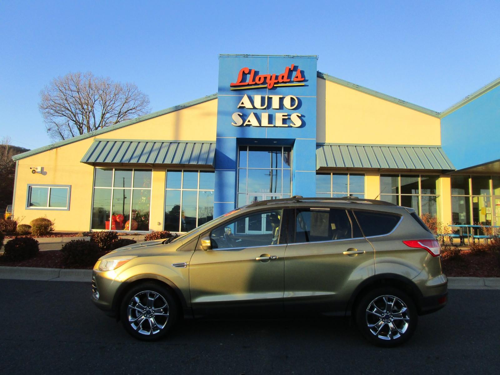 2013 Green /Black / Leather Ford Escape SEL FWD (1FMCU0HX4DU) with an 1.6L L4 DOHC 16V engine, 6-Speed Automatic transmission, located at 1814 Albert Pike Road, Hot Springs, AR, 71913, (501) 623-1717, 34.494228, -93.094070 - Photo #0