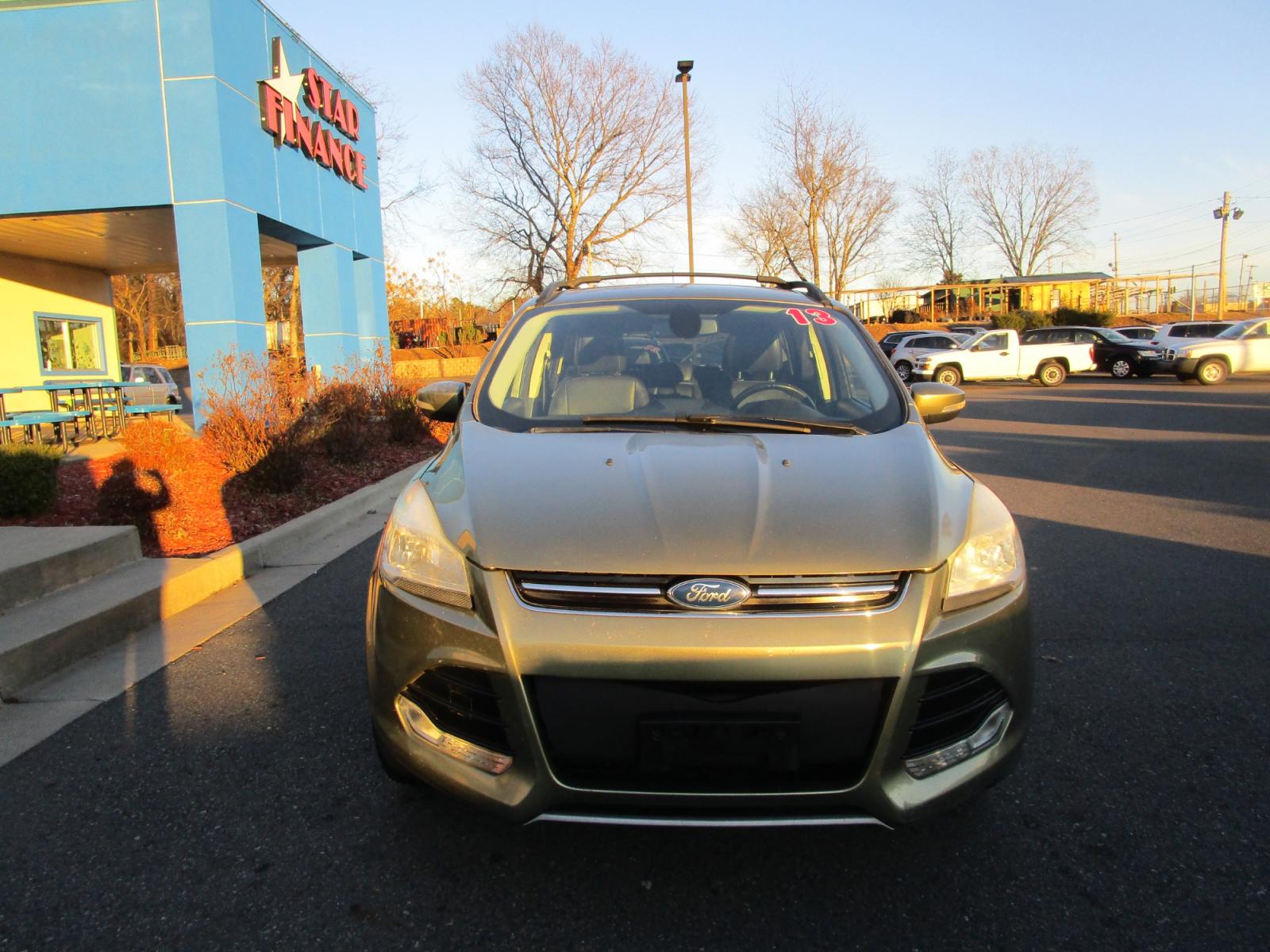 2013 Green /Black / Leather Ford Escape SEL FWD (1FMCU0HX4DU) with an 1.6L L4 DOHC 16V engine, 6-Speed Automatic transmission, located at 1814 Albert Pike Road, Hot Springs, AR, 71913, (501) 623-1717, 34.494228, -93.094070 - Photo #2