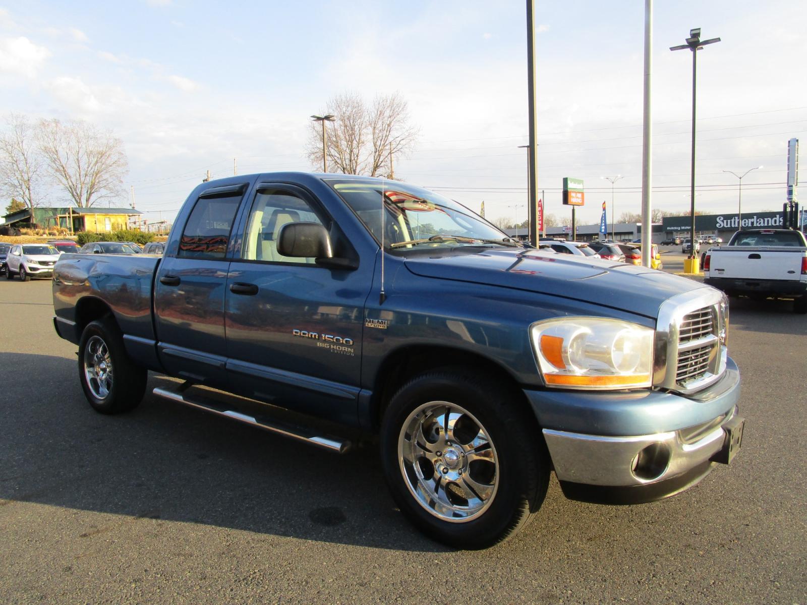 2006 Blue /Gray / Cloth Dodge Ram 1500 Laramie Quad Cab 2WD (1D7HA18296S) with an 5.7L V8 OHV 16V engine, 5-Speed Automatic Overdrive transmission, located at 1814 Albert Pike Road, Hot Springs, AR, 71913, (501) 623-1717, 34.494228, -93.094070 - Photo #3