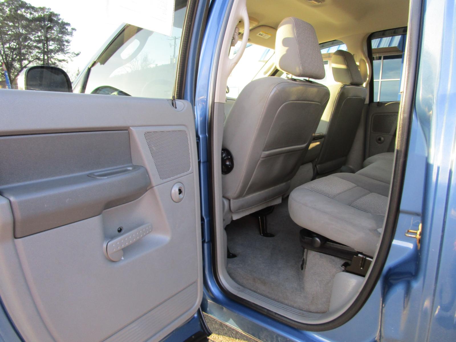 2006 Blue /Gray / Cloth Dodge Ram 1500 Laramie Quad Cab 2WD (1D7HA18296S) with an 5.7L V8 OHV 16V engine, 5-Speed Automatic Overdrive transmission, located at 1814 Albert Pike Road, Hot Springs, AR, 71913, (501) 623-1717, 34.494228, -93.094070 - Photo #5