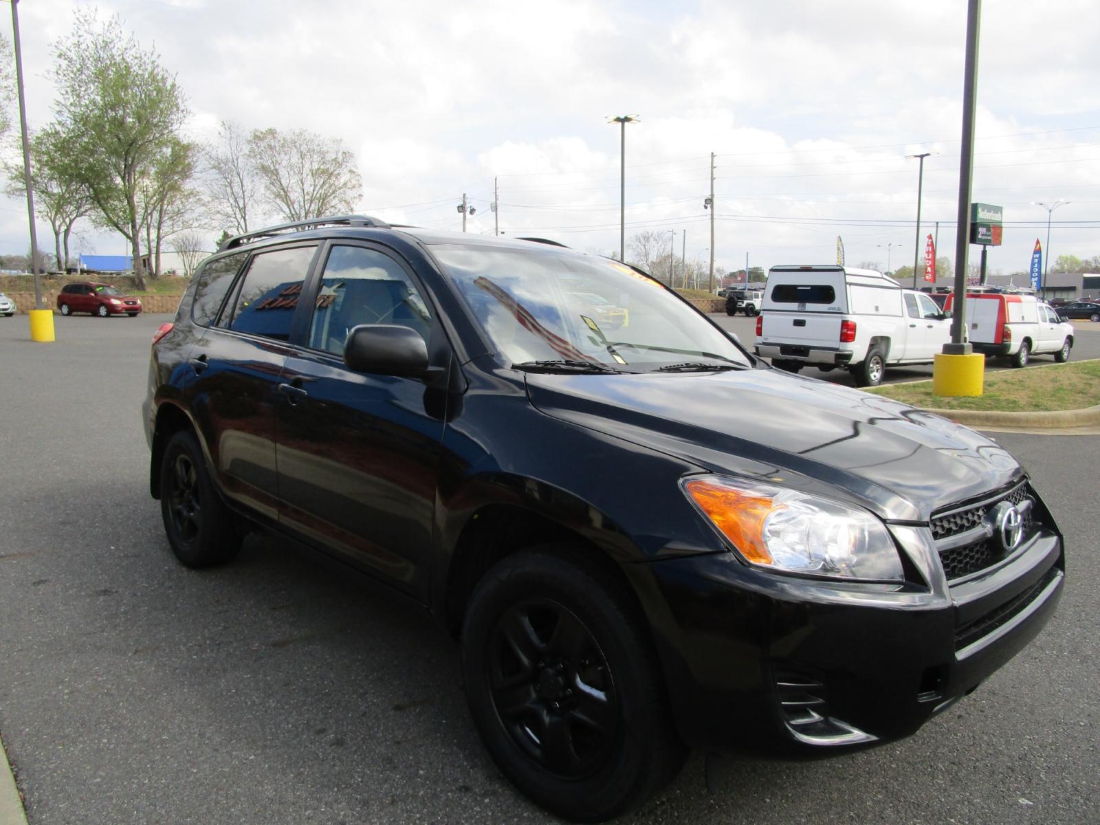2010 BLACK /Tan / Cloth Toyota RAV4 Base I4 4WD (JTMBF4DV3AD) with an 2.4L L4 DOHC 16V engine, 4-Speed Automatic transmission, located at 1814 Albert Pike Road, Hot Springs, AR, 71913, (501) 623-1717, 34.494228, -93.094070 - Photo #3