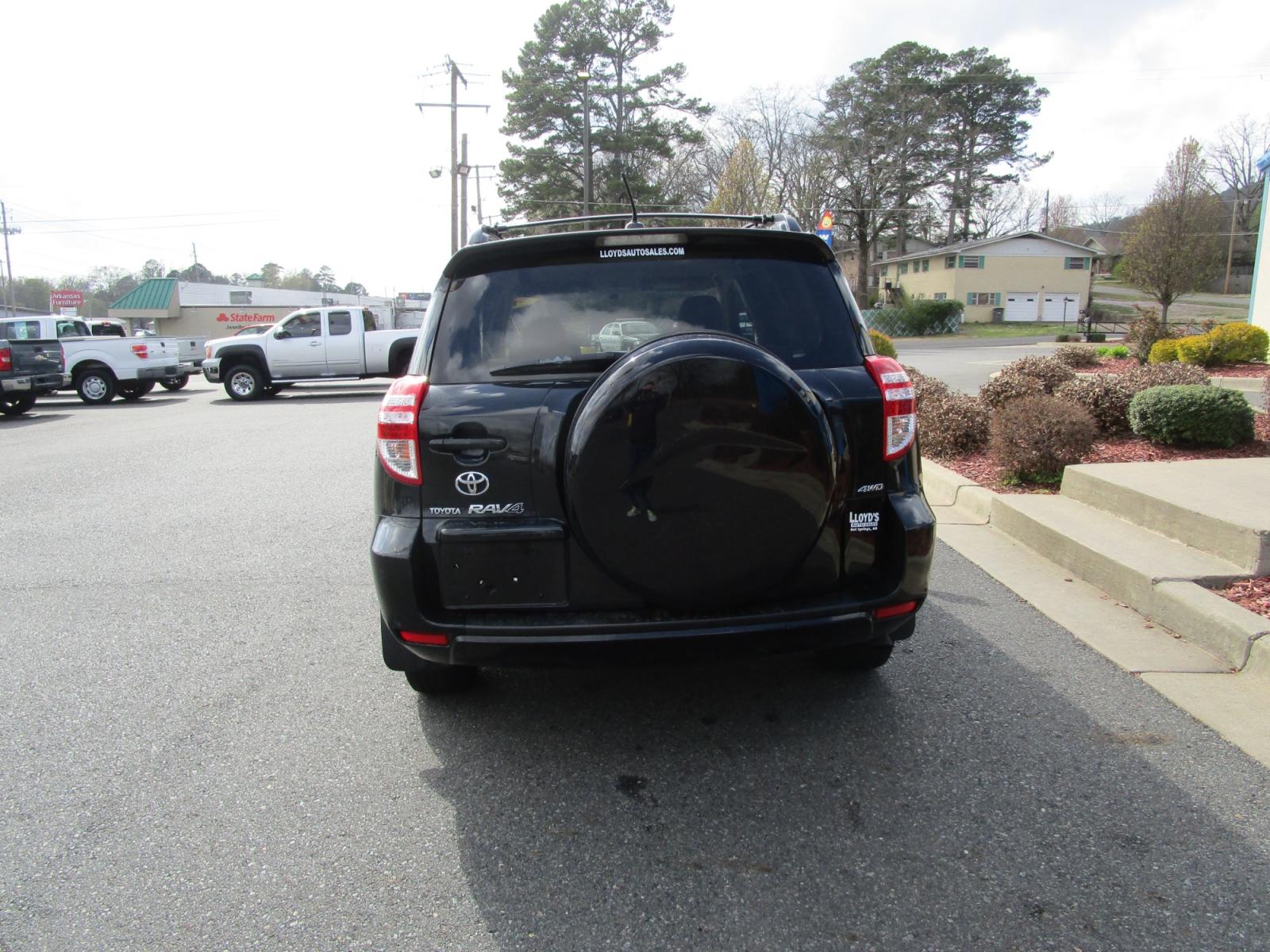 2010 BLACK /Tan / Cloth Toyota RAV4 Base I4 4WD (JTMBF4DV3AD) with an 2.4L L4 DOHC 16V engine, 4-Speed Automatic transmission, located at 1814 Albert Pike Road, Hot Springs, AR, 71913, (501) 623-1717, 34.494228, -93.094070 - Photo #4