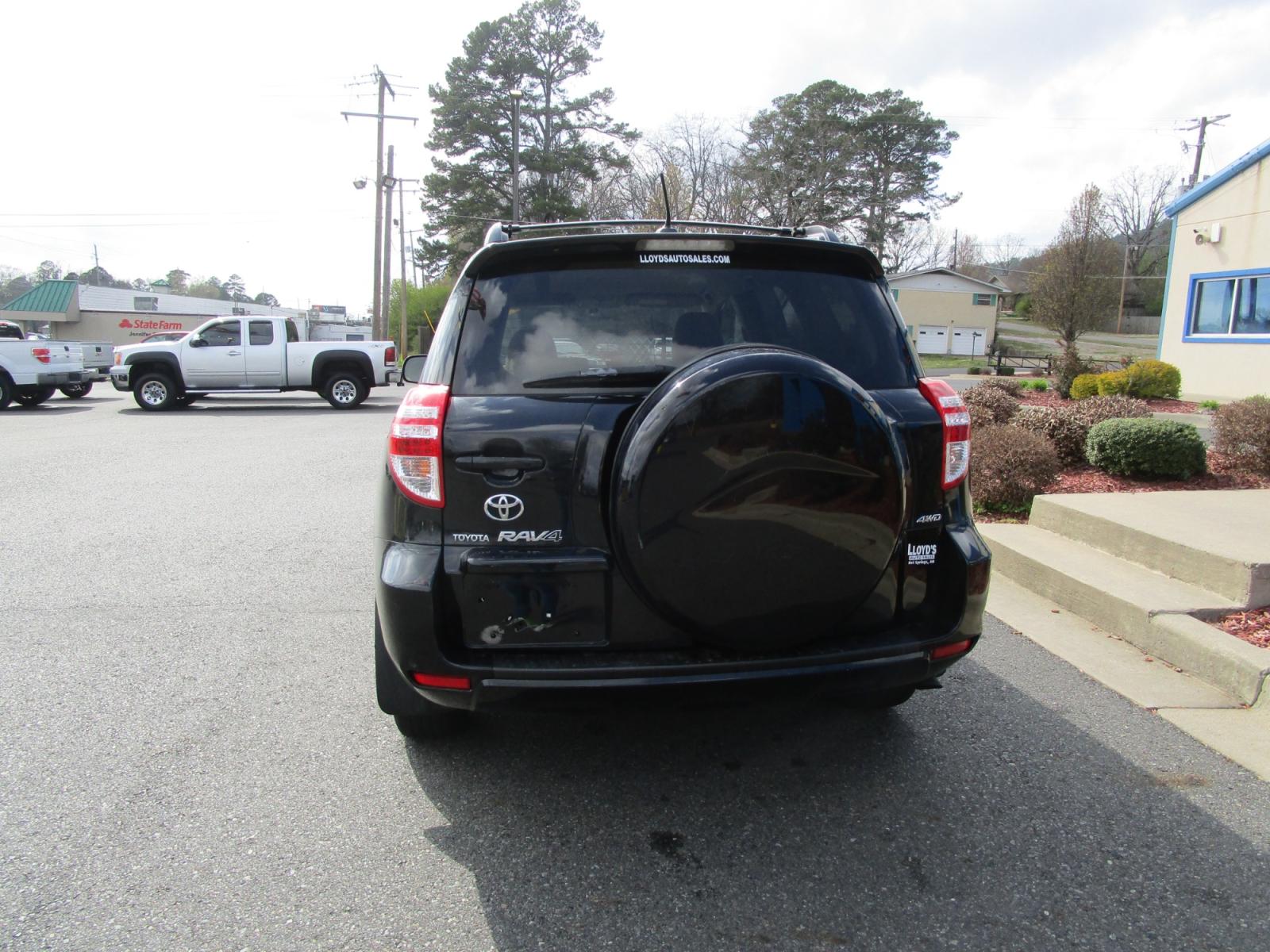 2010 BLACK /Tan / Cloth Toyota RAV4 Base I4 4WD (JTMBF4DV3AD) with an 2.4L L4 DOHC 16V engine, 4-Speed Automatic transmission, located at 1814 Albert Pike Road, Hot Springs, AR, 71913, (501) 623-1717, 34.494228, -93.094070 - Photo #5
