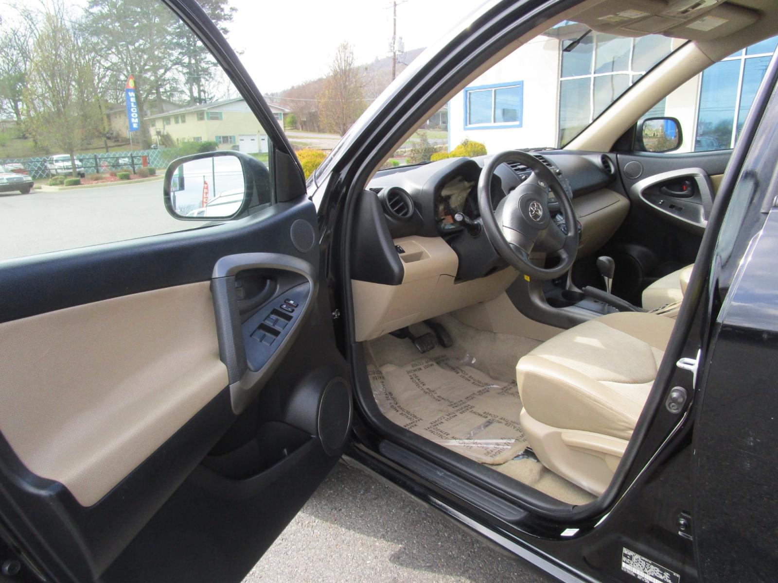 2010 BLACK /Tan / Cloth Toyota RAV4 Base I4 4WD (JTMBF4DV3AD) with an 2.4L L4 DOHC 16V engine, 4-Speed Automatic transmission, located at 1814 Albert Pike Road, Hot Springs, AR, 71913, (501) 623-1717, 34.494228, -93.094070 - Photo #8