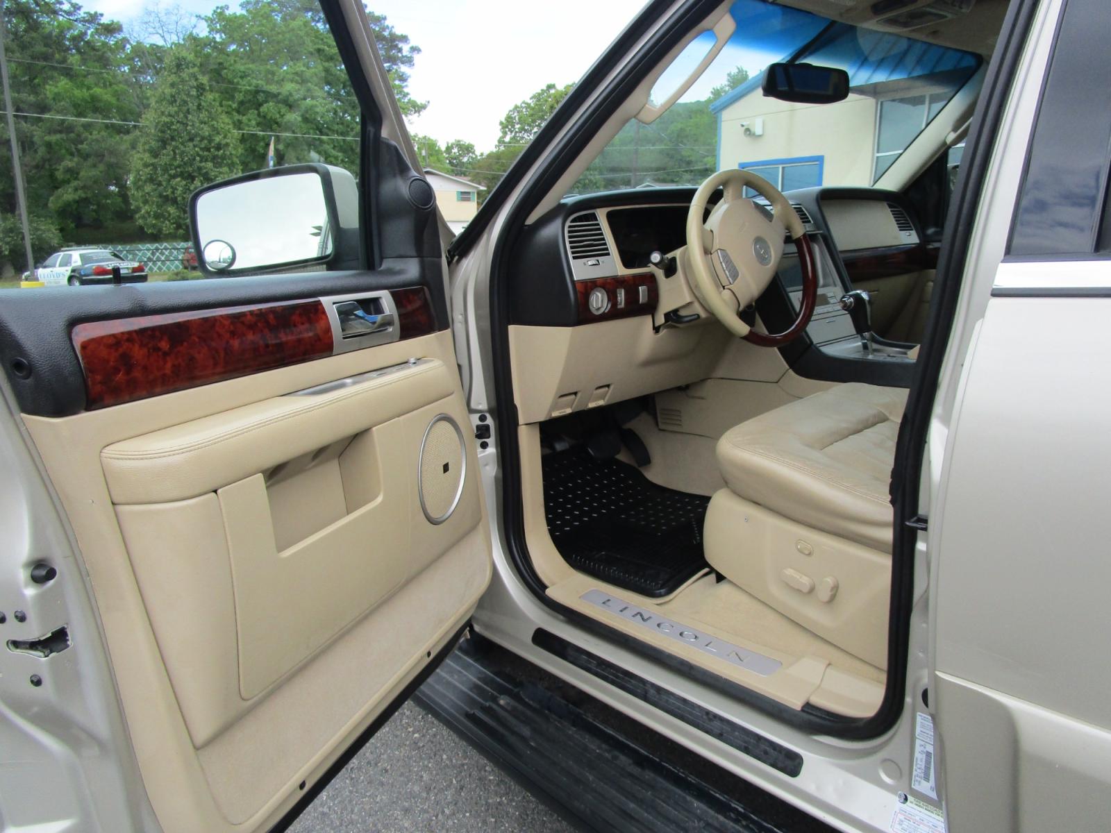 2005 Gold /Tan / Leather Lincoln Navigator Luxury 4WD (5LMFU285X5L) with an 5.4L V8 SOHC 24V engine, 6-Speed Automatic Overdrive transmission, located at 1814 Albert Pike Road, Hot Springs, AR, 71913, (501) 623-1717, 34.494228, -93.094070 - Photo #9