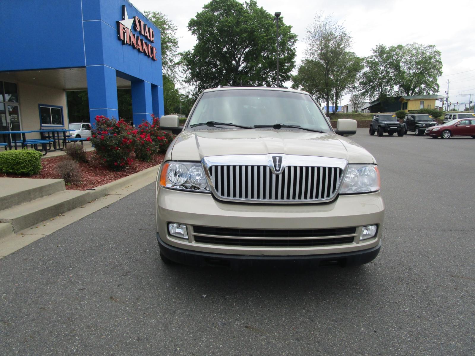 2005 Gold /Tan / Leather Lincoln Navigator Luxury 4WD (5LMFU285X5L) with an 5.4L V8 SOHC 24V engine, 6-Speed Automatic Overdrive transmission, located at 1814 Albert Pike Road, Hot Springs, AR, 71913, (501) 623-1717, 34.494228, -93.094070 - Photo #2