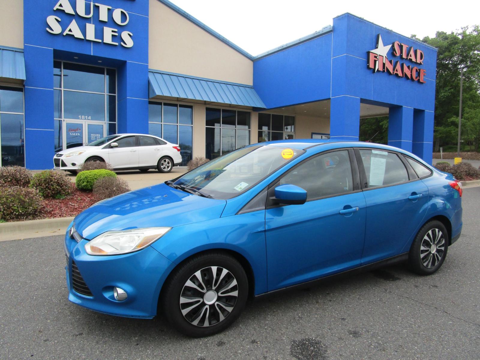 2012 Blue /Gray / Cloth Ford Focus SE Sedan (1FAHP3F24CL) with an 2.0L L4 DOHC 16V engine, located at 1814 Albert Pike Road, Hot Springs, AR, 71913, (501) 623-1717, 34.494228, -93.094070 - Photo #1