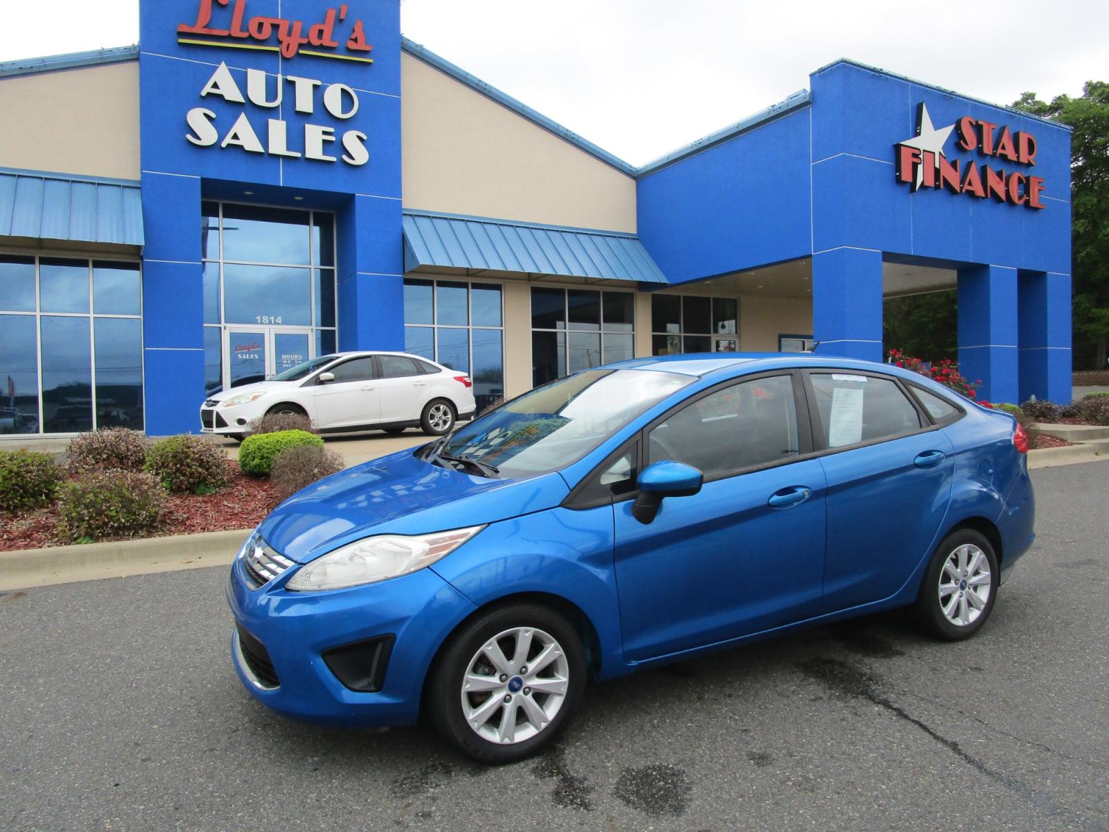 2012 Blue /Gray / Cloth Ford Fiesta SE Sedan (3FADP4BJ6CM) with an 1.6L L4 DOHC 16V engine, located at 1814 Albert Pike Road, Hot Springs, AR, 71913, (501) 623-1717, 34.494228, -93.094070 - Photo #1