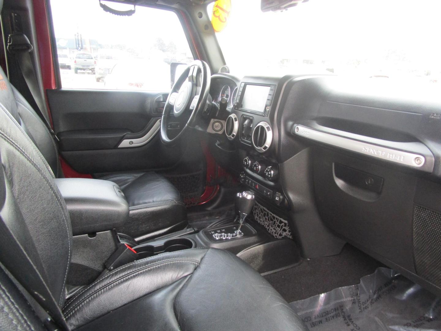 2013 MAROON /Black / Leather Jeep Wrangler Unlimited Sahara 4WD (1C4BJWEG9DL) with an 3.6L V6 DOHC 24V FFV engine, located at 1814 Albert Pike Road, Hot Springs, AR, 71913, (501) 623-1717, 34.494228, -93.094070 - Photo#5