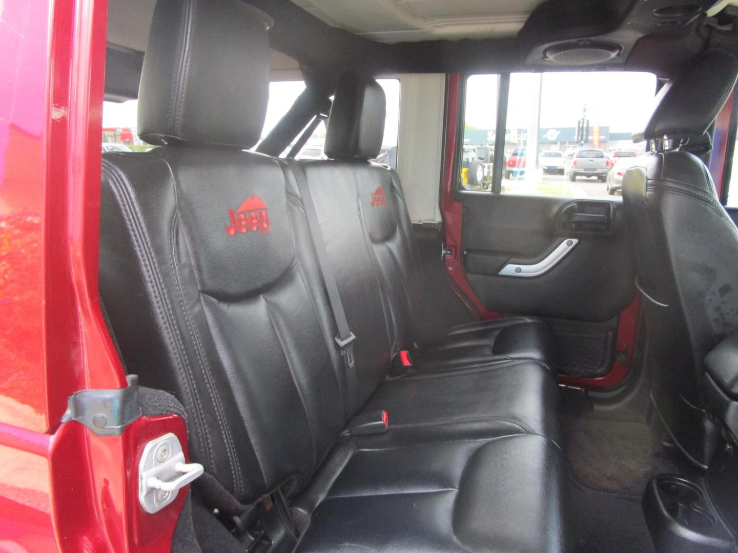 2013 MAROON /Black / Leather Jeep Wrangler Unlimited Sahara 4WD (1C4BJWEG9DL) with an 3.6L V6 DOHC 24V FFV engine, located at 1814 Albert Pike Road, Hot Springs, AR, 71913, (501) 623-1717, 34.494228, -93.094070 - Photo#6