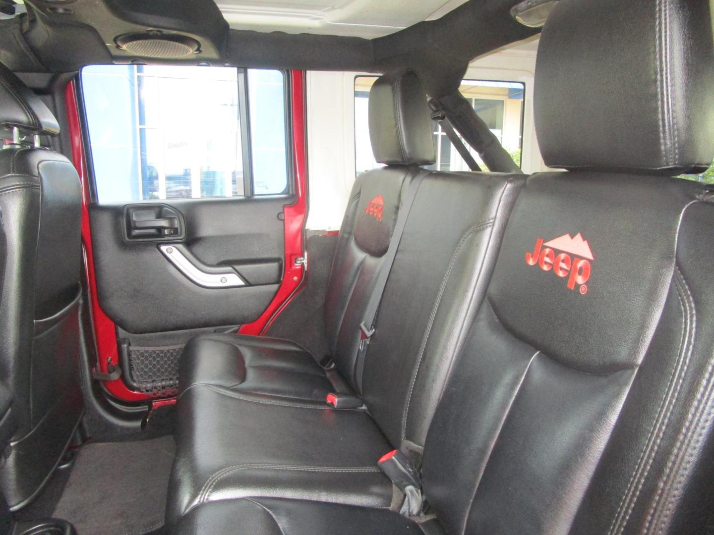 2013 MAROON /Black / Leather Jeep Wrangler Unlimited Sahara 4WD (1C4BJWEG9DL) with an 3.6L V6 DOHC 24V FFV engine, located at 1814 Albert Pike Road, Hot Springs, AR, 71913, (501) 623-1717, 34.494228, -93.094070 - Photo#7