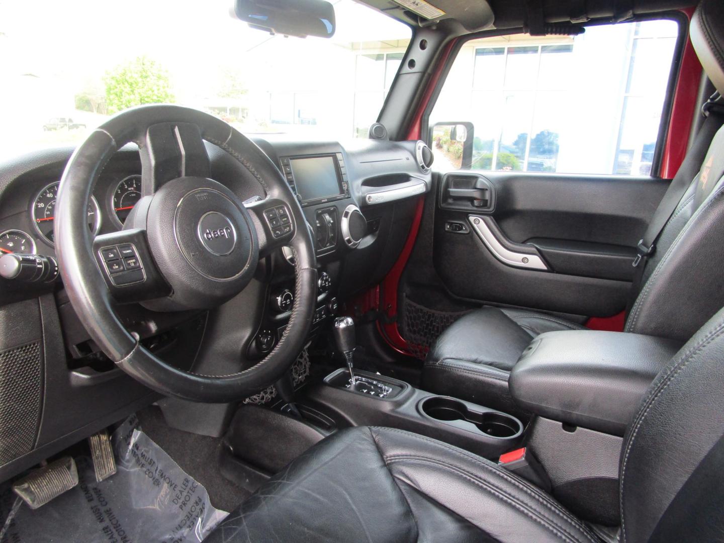 2013 MAROON /Black / Leather Jeep Wrangler Unlimited Sahara 4WD (1C4BJWEG9DL) with an 3.6L V6 DOHC 24V FFV engine, located at 1814 Albert Pike Road, Hot Springs, AR, 71913, (501) 623-1717, 34.494228, -93.094070 - Photo#4