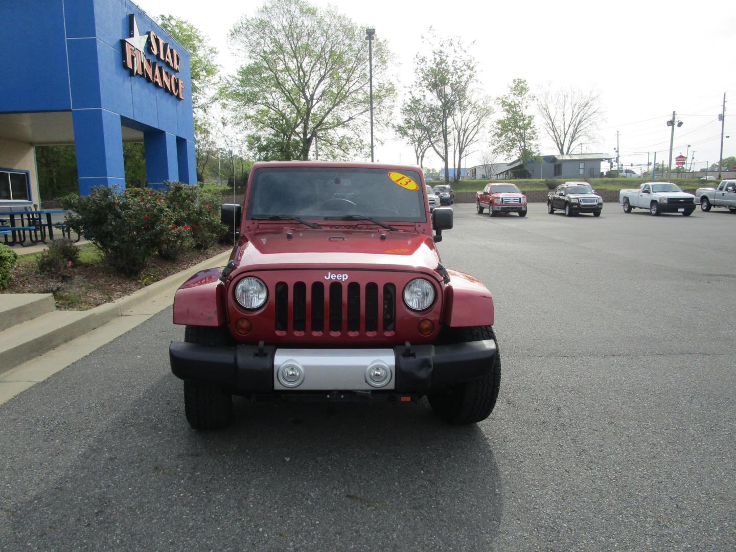 2013 MAROON /Black / Leather Jeep Wrangler Unlimited Sahara 4WD (1C4BJWEG9DL) with an 3.6L V6 DOHC 24V FFV engine, located at 1814 Albert Pike Road, Hot Springs, AR, 71913, (501) 623-1717, 34.494228, -93.094070 - Photo#1