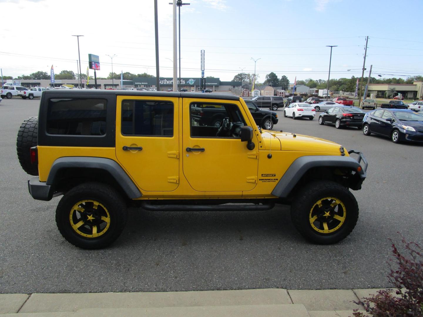 2015 Yellow /YELLOW/BLACK Jeep Wrangler Unlimited Sport 4WD (1C4BJWDG8FL) with an 3.6L V6 DOHC 24V FFV engine, located at 1814 Albert Pike Road, Hot Springs, AR, 71913, (501) 623-1717, 34.494228, -93.094070 - 2015 Jeep Wrangler Unlimited Sport 4X4 3.6L V6 24-Valve VVT Engine. 5 Speed Automatic Transmission. Exterior Features: "Trail Rated" Badge. Sunrider Soft Top. Full Metal Doors with Roll-up Windows. Fog Lamps. 2 Front Tow Hooks and 1 Rear Tow Hook. Interior Features: Rearview Day/Night Mirr - Photo#2