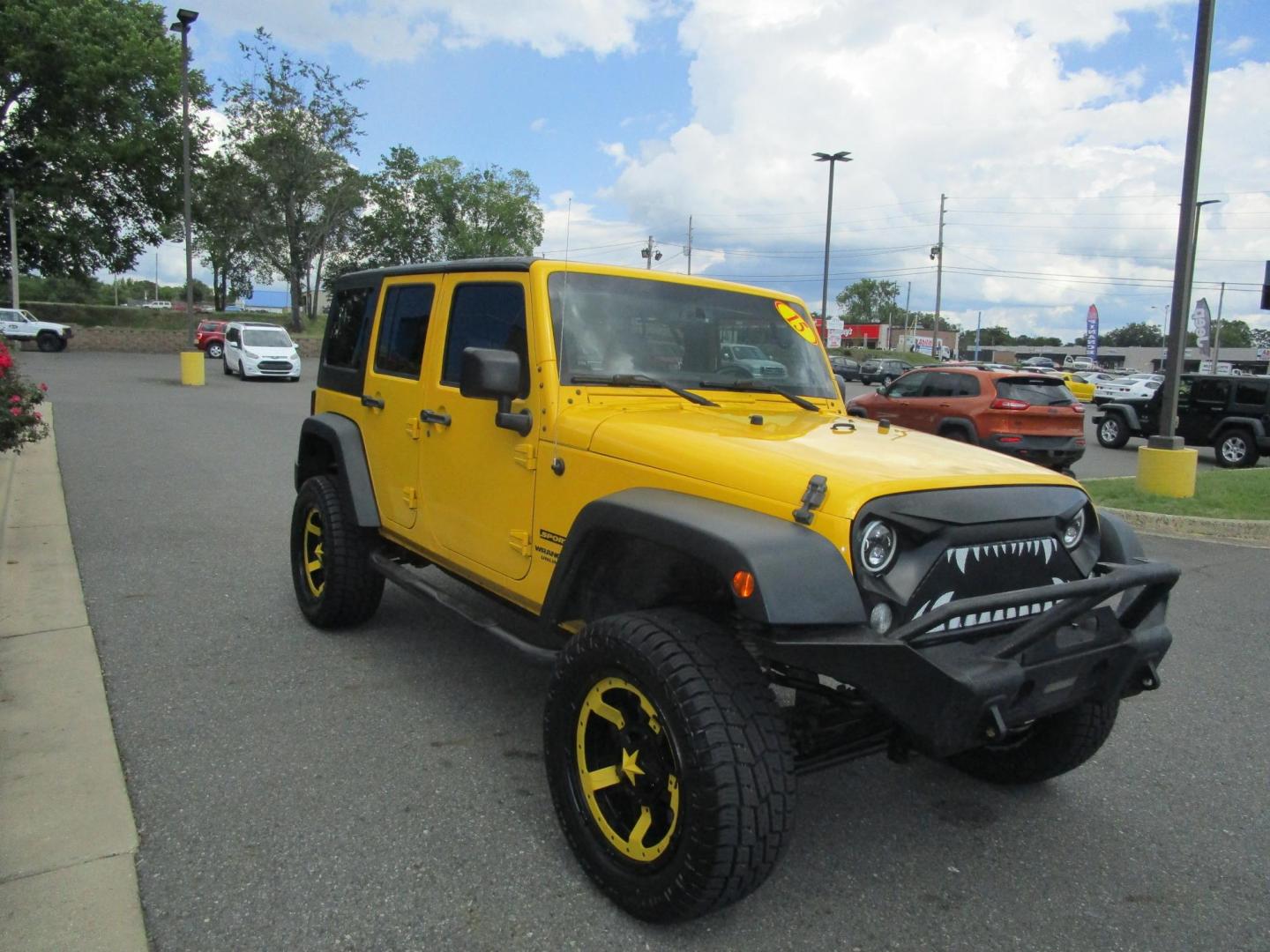 2015 Yellow /YELLOW/BLACK Jeep Wrangler Unlimited Sport 4WD (1C4BJWDG8FL) with an 3.6L V6 DOHC 24V FFV engine, AUTOMATIC transmission, located at 1814 Albert Pike Road, Hot Springs, AR, 71913, (501) 623-1717, 34.494228, -93.094070 - 2015 Jeep Wrangler Unlimited Sport 4X4 3.6L V6 24-Valve VVT Engine. 5 Speed Automatic Transmission. Exterior Features: "Trail Rated" Badge. Sunrider Soft Top. Full Metal Doors with Roll-up Windows. Fog Lamps. 2 Front Tow Hooks and 1 Rear Tow Hook. Interior Features: Rearview Day/Night Mirr - Photo#3