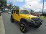 2015 Yellow /YELLOW/BLACK Jeep Wrangler Unlimited Sport 4WD (1C4BJWDG8FL) with an 3.6L V6 DOHC 24V FFV engine, AUTOMATIC transmission, located at 1814 Albert Pike Road, Hot Springs, AR, 71913, (501) 623-1717, 34.494228, -93.094070 - 2015 Jeep Wrangler Unlimited Sport 4X4 3.6L V6 24-Valve VVT Engine. 5 Speed Automatic Transmission. Exterior Features: "Trail Rated" Badge. Sunrider Soft Top. Full Metal Doors with Roll-up Windows. Fog Lamps. 2 Front Tow Hooks and 1 Rear Tow Hook. Interior Features: Rearview Day/Night Mirr - Photo#3