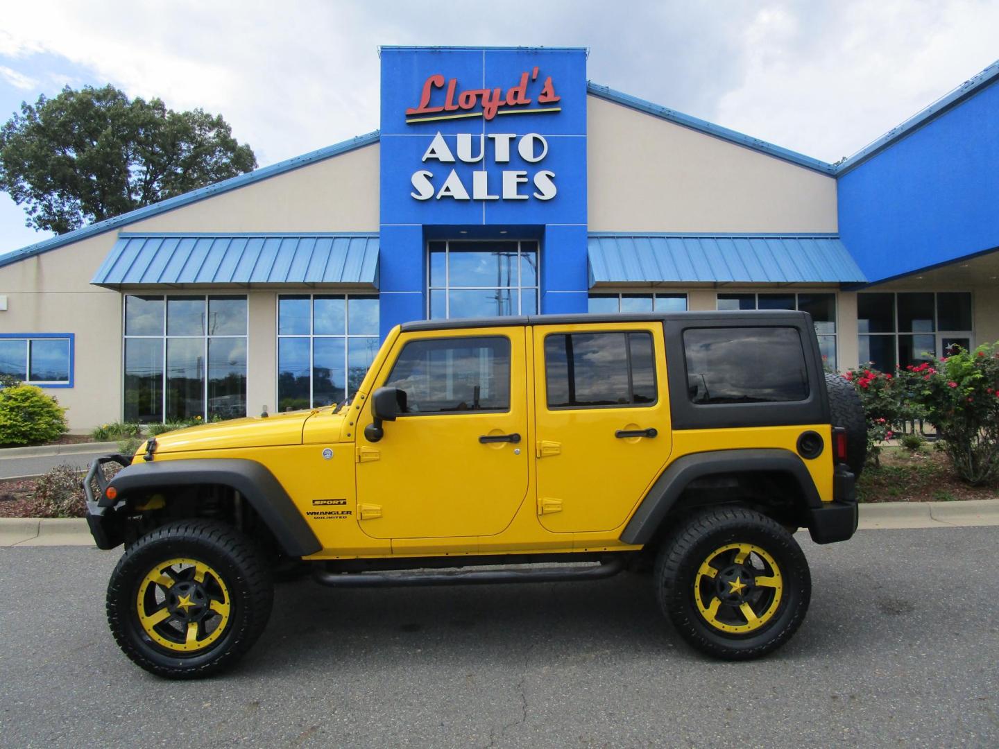 2015 Yellow /YELLOW/BLACK Jeep Wrangler Unlimited Sport 4WD (1C4BJWDG8FL) with an 3.6L V6 DOHC 24V FFV engine, AUTOMATIC transmission, located at 1814 Albert Pike Road, Hot Springs, AR, 71913, (501) 623-1717, 34.494228, -93.094070 - 2015 Jeep Wrangler Unlimited Sport 4X4 3.6L V6 24-Valve VVT Engine. 5 Speed Automatic Transmission. Exterior Features: "Trail Rated" Badge. Sunrider Soft Top. Full Metal Doors with Roll-up Windows. Fog Lamps. 2 Front Tow Hooks and 1 Rear Tow Hook. Interior Features: Rearview Day/Night Mirr - Photo#0