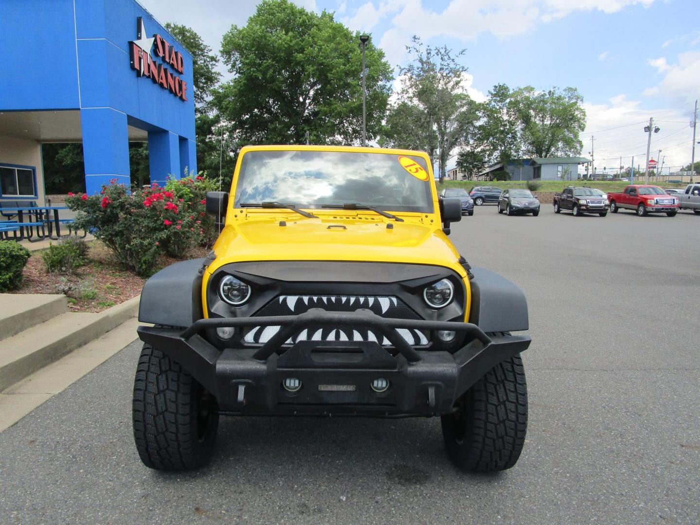 2015 Yellow /YELLOW/BLACK Jeep Wrangler Unlimited Sport 4WD (1C4BJWDG8FL) with an 3.6L V6 DOHC 24V FFV engine, AUTOMATIC transmission, located at 1814 Albert Pike Road, Hot Springs, AR, 71913, (501) 623-1717, 34.494228, -93.094070 - 2015 Jeep Wrangler Unlimited Sport 4X4 3.6L V6 24-Valve VVT Engine. 5 Speed Automatic Transmission. Exterior Features: "Trail Rated" Badge. Sunrider Soft Top. Full Metal Doors with Roll-up Windows. Fog Lamps. 2 Front Tow Hooks and 1 Rear Tow Hook. Interior Features: Rearview Day/Night Mirr - Photo#2