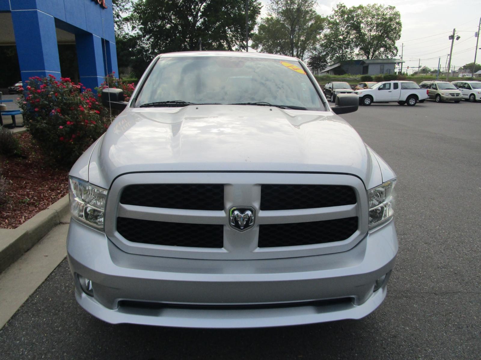 2014 SILVER RAM 1500 Tradesman Quad Cab 2WD (1C6RR6FG9ES) with an 3.6L V6 DOHC 24V FFV engine, 6-Speed Automatic transmission, located at 1814 Albert Pike Road, Hot Springs, AR, 71913, (501) 623-1717, 34.494228, -93.094070 - Photo #0