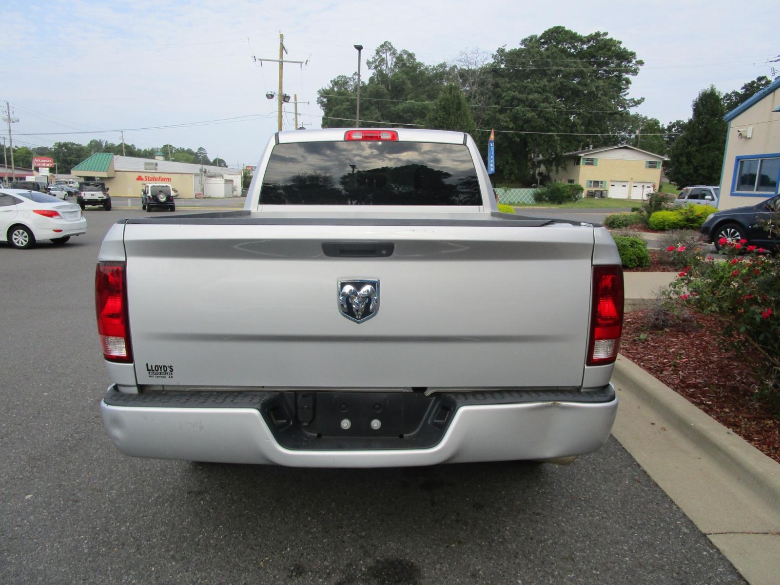 2014 SILVER RAM 1500 Tradesman Quad Cab 2WD (1C6RR6FG9ES) with an 3.6L V6 DOHC 24V FFV engine, 6-Speed Automatic transmission, located at 1814 Albert Pike Road, Hot Springs, AR, 71913, (501) 623-1717, 34.494228, -93.094070 - Photo #2