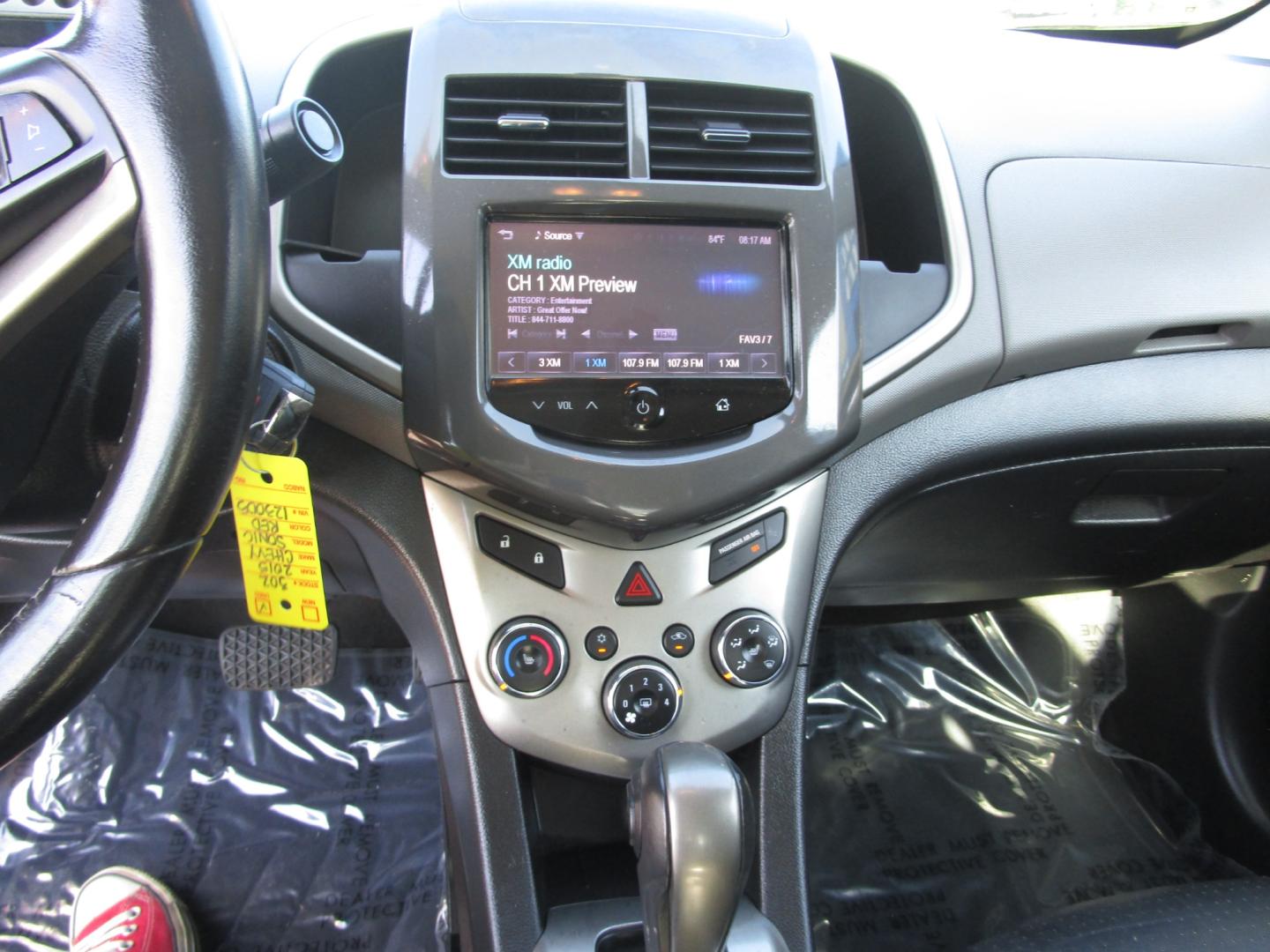 2015 RED /Black / Leather Chevrolet Sonic LTZ Auto Sedan (1G1JE5SB4F4) with an 1.4L L4 DOHC 24V TURBO engine, 6-Speed Automatic transmission, located at 1814 Albert Pike Road, Hot Springs, AR, 71913, (501) 623-1717, 34.494228, -93.094070 - Photo#1