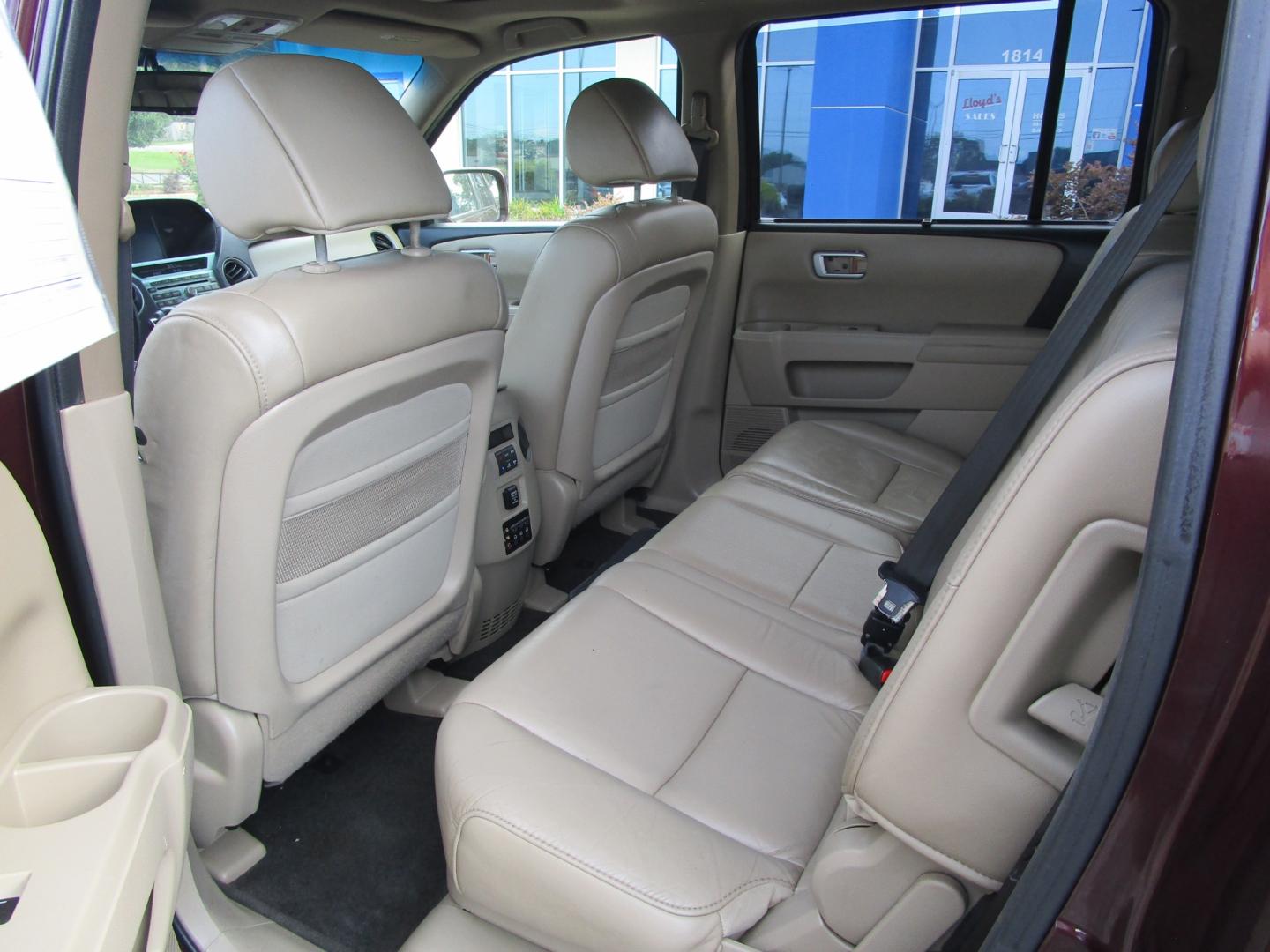 2011 MAROON Honda Pilot Touring 2WD 5-Spd AT with DVD (5FNYF3H96BB) with an 3.5L V6 SOHC 24V engine, 5-Speed Automatic transmission, located at 1814 Albert Pike Road, Hot Springs, AR, 71913, (501) 623-1717, 34.494228, -93.094070 - 2011 Honda Pilot Touring 4 Door SUV 3.5L V6 F SOHC 24V Gasoline Front Wheel Drive. 3rd Row Seating. - Photo#5