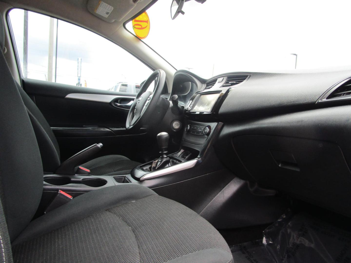 2019 WHITE /BLACK Nissan Sentra S CVT (3N1AB7AP3KY) with an 1.8L L4 SFI DOHC 16V engine, CVT transmission, located at 1814 Albert Pike Road, Hot Springs, AR, 71913, (501) 623-1717, 34.494228, -93.094070 - Mechanical & Performance Features: 1.8L DOHC 4-cylinder Engine. 6 Speed Manual transmission. Eco mode. Front and rear stabilizer bars. power-assisted vented front disc / rear drum brakes. Safety & Security Features: Lower anchors & tethers for children (Latch). Anti-lock braking system. Traction - Photo#8