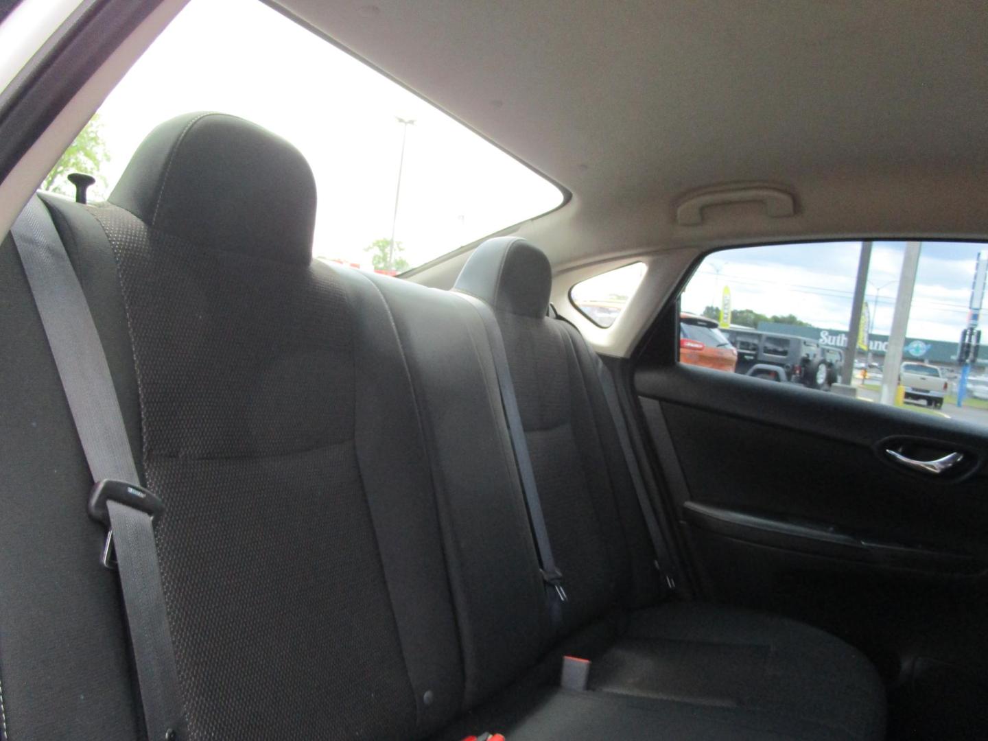 2019 WHITE /BLACK Nissan Sentra S CVT (3N1AB7AP3KY) with an 1.8L L4 SFI DOHC 16V engine, CVT transmission, located at 1814 Albert Pike Road, Hot Springs, AR, 71913, (501) 623-1717, 34.494228, -93.094070 - Mechanical & Performance Features: 1.8L DOHC 4-cylinder Engine. 6 Speed Manual transmission. Eco mode. Front and rear stabilizer bars. power-assisted vented front disc / rear drum brakes. Safety & Security Features: Lower anchors & tethers for children (Latch). Anti-lock braking system. Traction - Photo#9