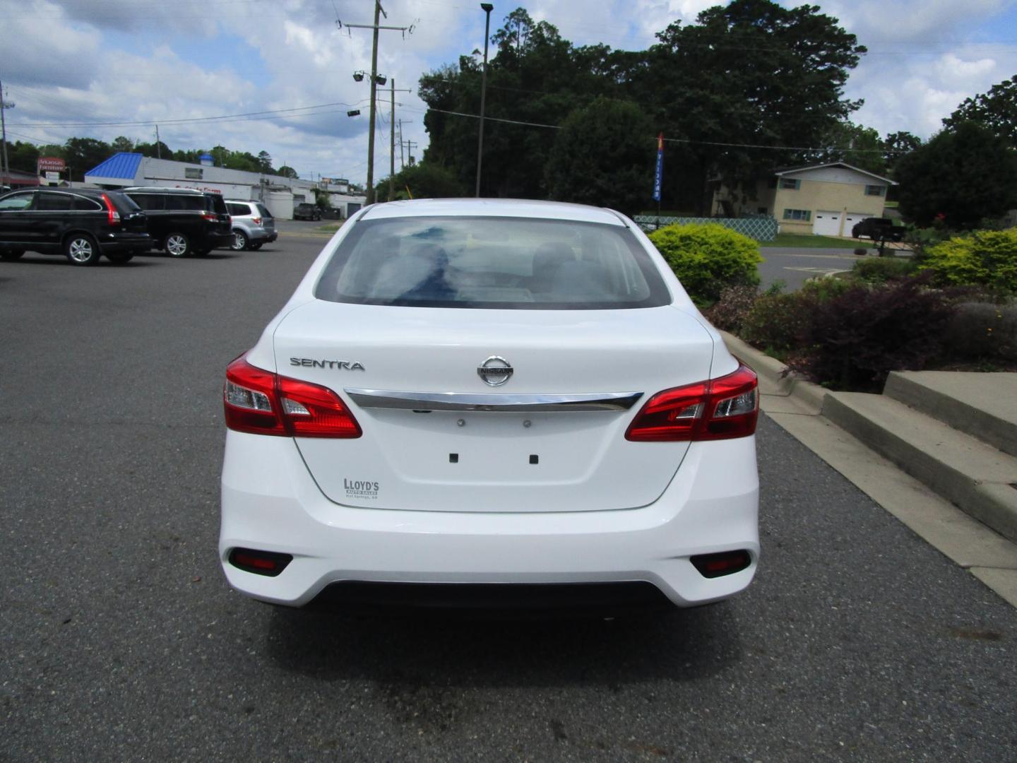 2019 WHITE /BLACK Nissan Sentra S CVT (3N1AB7AP3KY) with an 1.8L L4 SFI DOHC 16V engine, CVT transmission, located at 1814 Albert Pike Road, Hot Springs, AR, 71913, (501) 623-1717, 34.494228, -93.094070 - Mechanical & Performance Features: 1.8L DOHC 4-cylinder Engine. 6 Speed Manual transmission. Eco mode. Front and rear stabilizer bars. power-assisted vented front disc / rear drum brakes. Safety & Security Features: Lower anchors & tethers for children (Latch). Anti-lock braking system. Traction - Photo#5