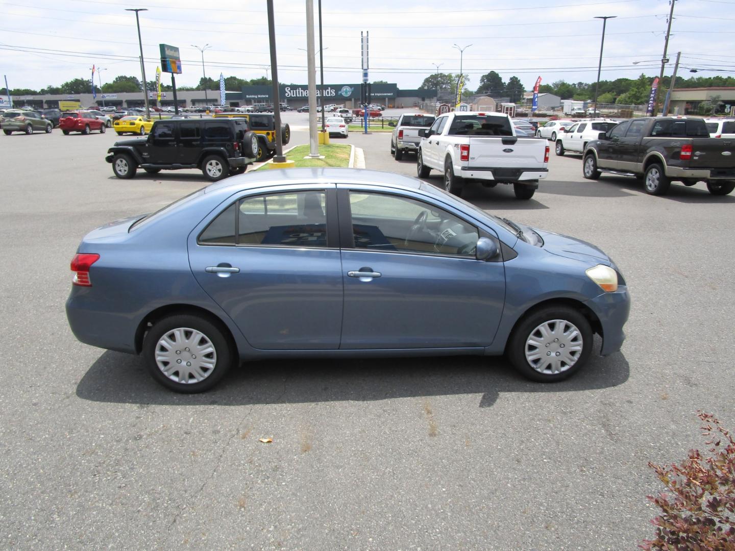 2011 Blue Toyota Yaris Sedan 4-Speed AT (JTDBT4K33B4) with an 1.5L L4 DOHC 16V engine, 4-Speed Automatic transmission, located at 1814 Albert Pike Road, Hot Springs, AR, 71913, (501) 623-1717, 34.494228, -93.094070 - 2001 Toyota Yaris 4 door Sedan. 1.5L I4 F DOHC 16V Gasoline Front Wheel Drive - Photo#2
